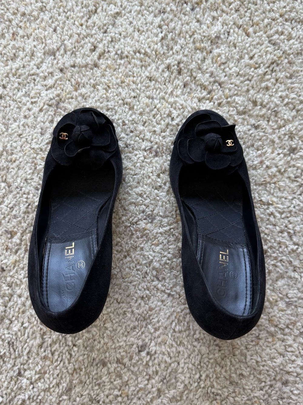 CHANEL Women’s Black Suede Camellia Pumps